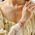 European and american new arrival versatile jewelry: minimalist white pearl bracelet, women's butterfly finger chain bracelet - wholesale from manufacturer