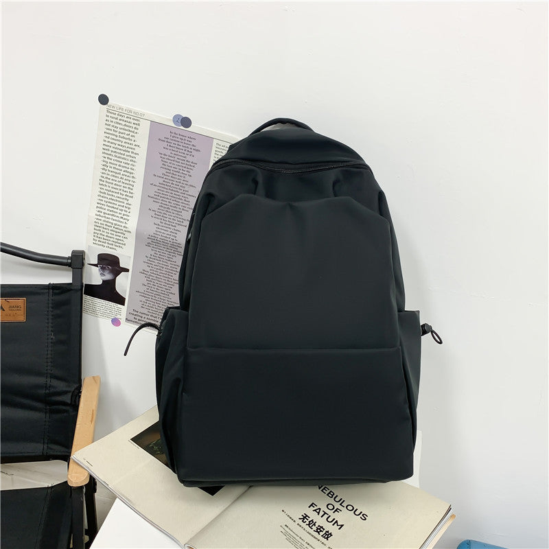 Campus Japanese backpack versatile male and female junior high school college student schoolbag solid color casual large capacity travel backpack