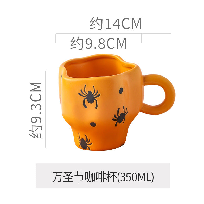 Creative halloween-themed ceramic cup and saucer set, featuring an irregular design with pumpkin and bat motifs. perfect for coffee or tea