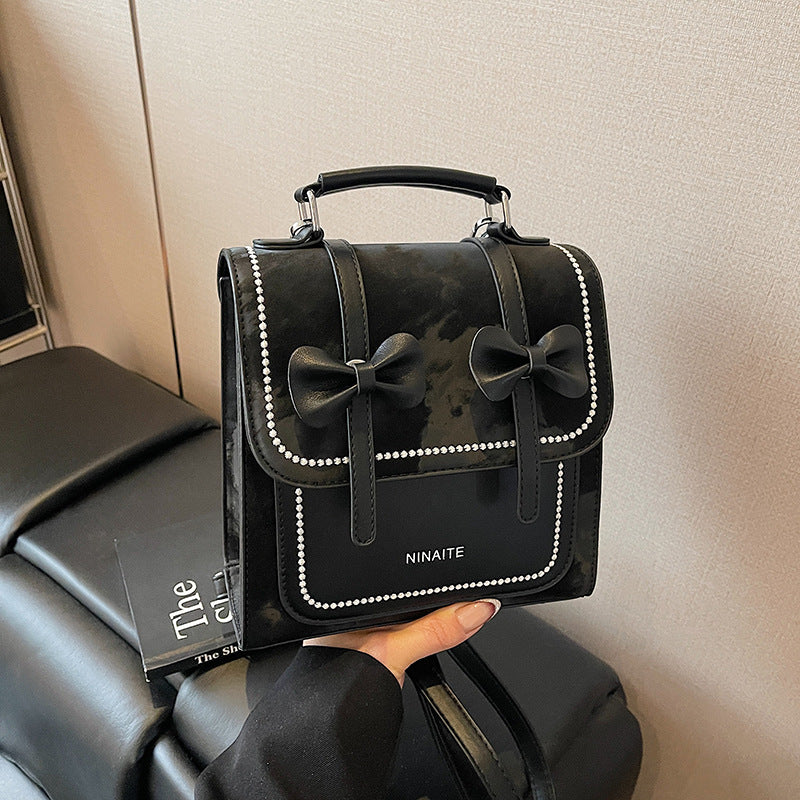 New backpack women's versatile casual portable Korean version student schoolbag small square bag premium sense lightweight travel backpack