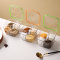 Transparent four-compartment spice box with spoons, creative flip-top kitchen seasoning container, plastic airtight jar, household seasoning bottle set