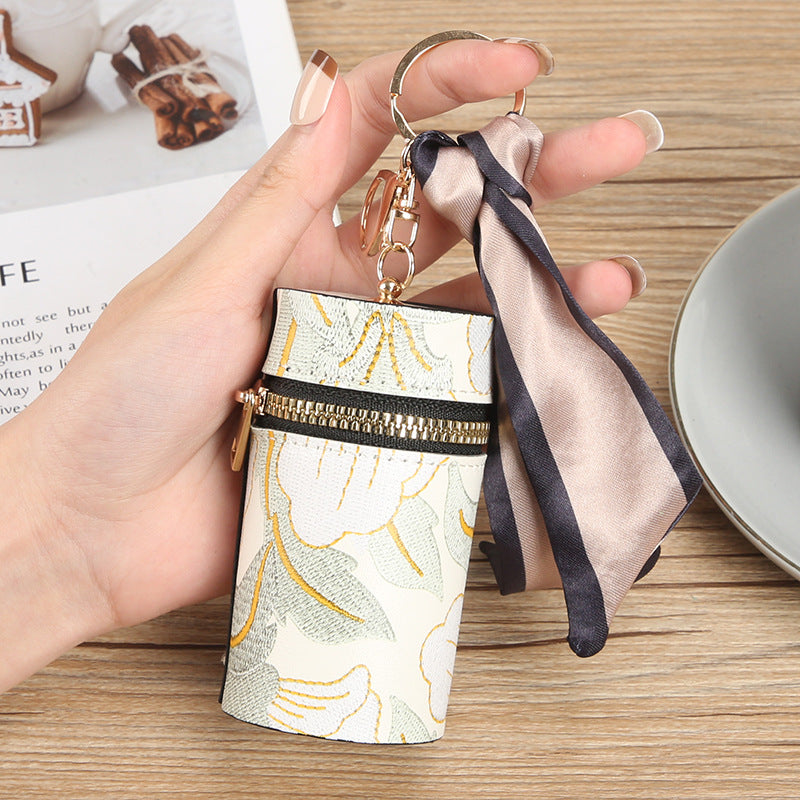 Manufacturer spot Guofeng fashion bag change bag small clear flower portable earphone port red envelope car key pendant