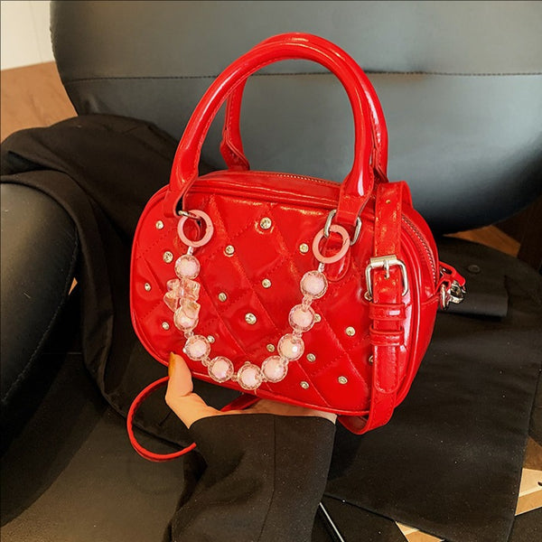Temperament light luxury portable banquet bag women's 2025 new fashion diamond-encrusted pearl shoulder pillow bag commuter messenger bag