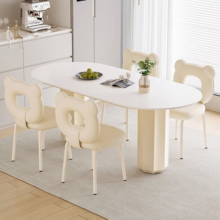 Cream style household rock slab oval dining table small apartment modern simple Internet celebrity light luxury family pure white rice table and chairs