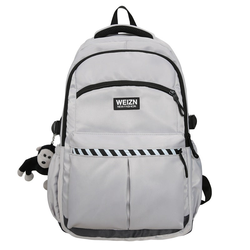 School bag male large capacity junior high school student middle school student fashion trend simple backpack female business travel bag