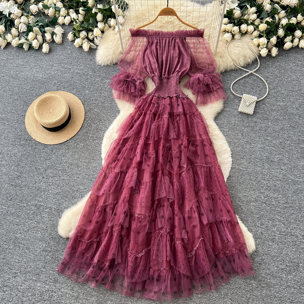Sweet and lovely pink mesh dress for women, perfect for summer. features an off-the-shoulder design, puff sleeves, a high waist, and an a-line silhouette. an ethereal, fairy-tale style