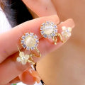 Luxury fashion floral earrings - unique studs, geometric ear cuffs, and accessories featuring geometric floral design details
