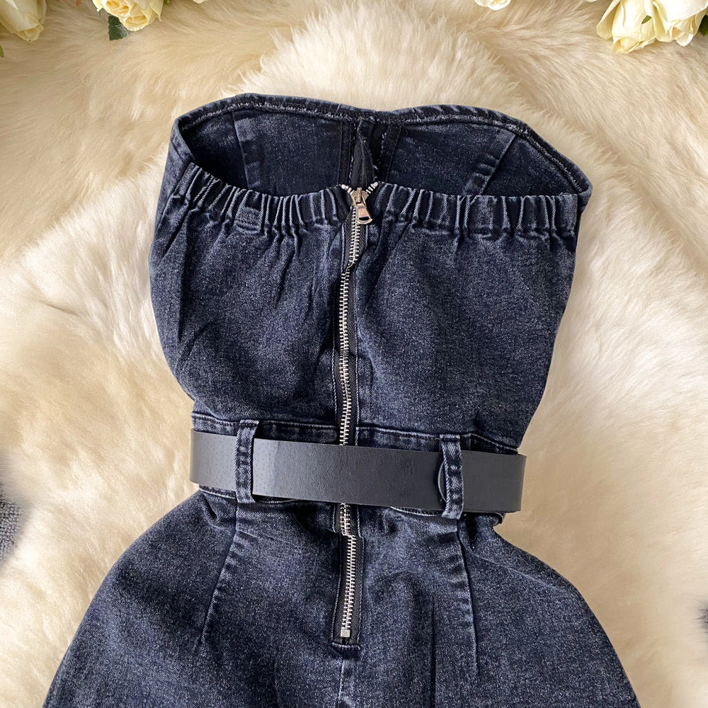 This year's trendy look for petite women: stylish, high-waisted, slim-fit, sleeveless, strapless jumpsuit with hot-fix rhinestone embellishments