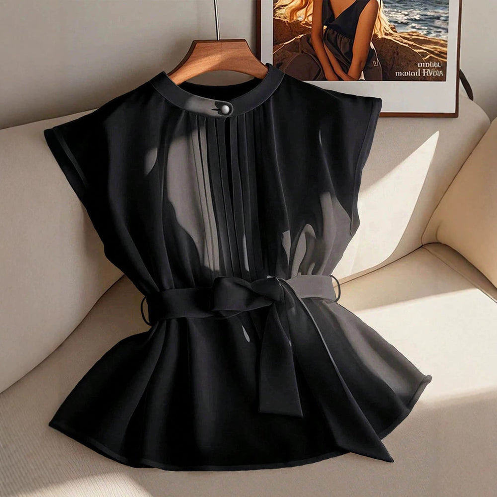 plus size french sleeveless top with stand collar, single button, chest pleat, tie waist, semi-sheer and flowy
