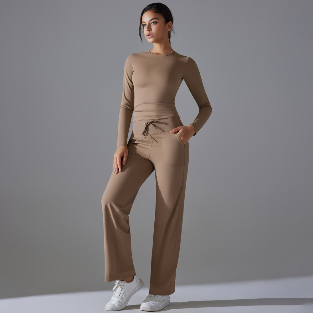 High-waisted, butt-lifting, drawstring wide-leg pants with a barely-there feel, paired with a form-fitting, long-sleeved yoga top. breathable, quick-drying, perfect for outdoor running and fitness