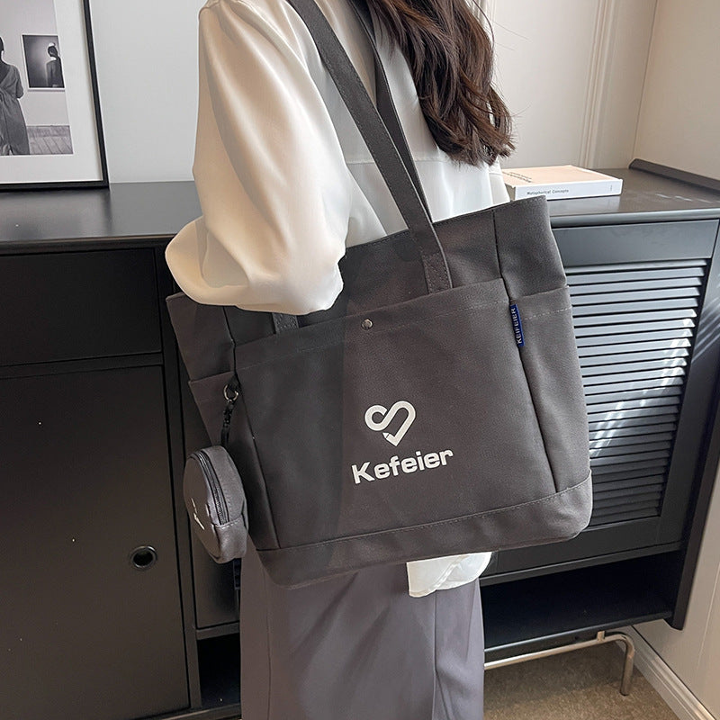 Canvas bag, women's large-capacity 2023 new high-end shoulder bag, college student class versatile commuter tote bag