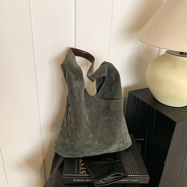 This season's fashion trend French sense autumn and winter simple large-capacity triangular tote bag women's shoulder armpit bag