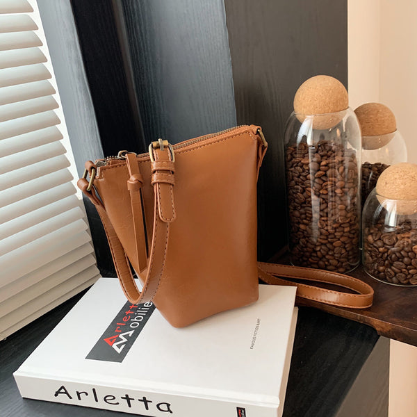 This year's popular small bag women's Korean version striped women's bag fashionable versatile shoulder bag simple messenger mobile phone bucket bag