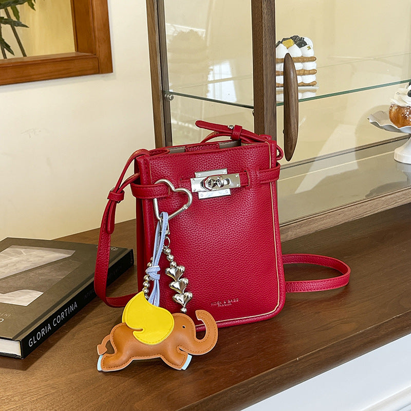 Cross-border niche design messenger bag women's high-end sense new Japanese and Korean bags simple  lock single shoulder messenger bag