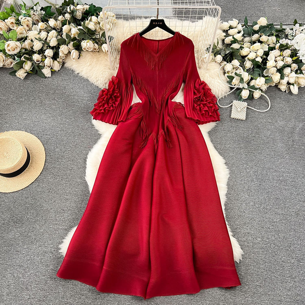 European court style women's dress - designer tassel v-neck slim fit maxi dress with miyake-inspired pleats and flared sleeves