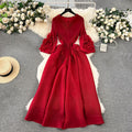 European court style women's dress - designer tassel v-neck slim fit maxi dress with miyake-inspired pleats and flared sleeves