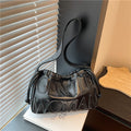 Thailand gentle woman drawstring bag women's 2026 new embossed letter shoulder bag trendy tote bag