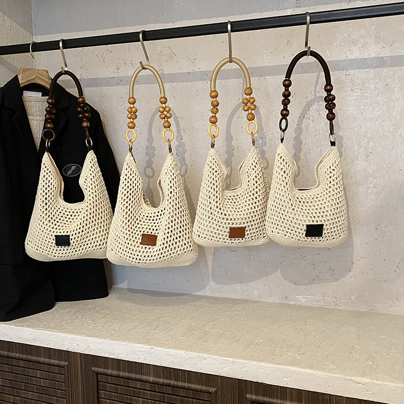 Casual large-capacity cotton thread woven bag New hollow hand-woven shoulder bag Vacation beach bag Versatile women's bag