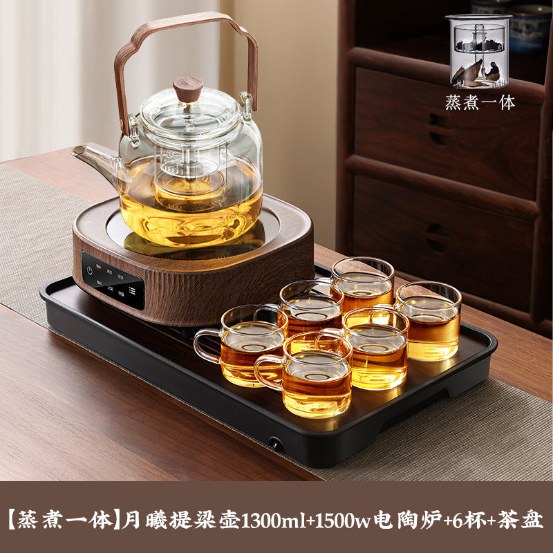 A complete set of wood grain electric ceramic stoves for making tea around the stove, a set of glass teapots for making tea around the stove, and an electric stove
