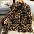 Luxury leopard print blouse with tie-waist, stand collar, and lantern sleeves - elegant workwear for women, 1688 source