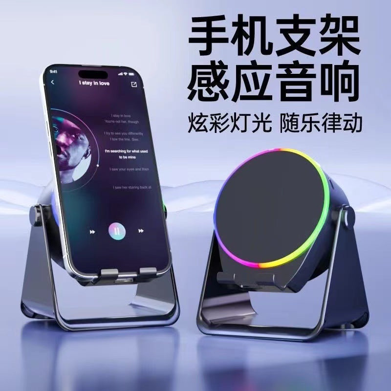 new arrival multifunctional wireless sensor speaker rotating phone holder bluetooth speaker - direct from the source