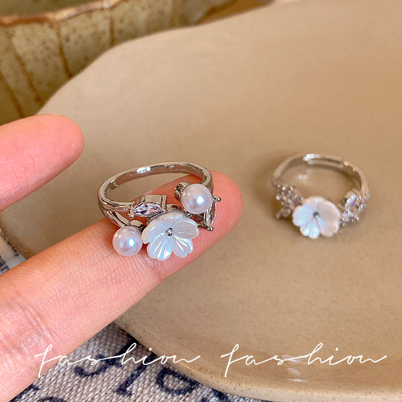 Xiaohongshu best selling gentle and cool camellia ring for women classytrendyeasiest for match open ring pearl hand jewelry