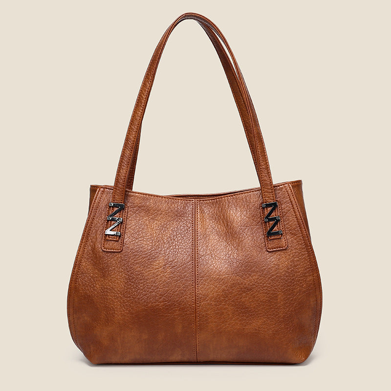 wholesale women's bags 2026: fashionable, minimalist, casual tote bags, large capacity soft leather shoulder bags, new mom bags