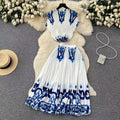 European and american cross-border fashion women's clothing  autumn new french-style design printed top and pleated skirt set with cinched waist