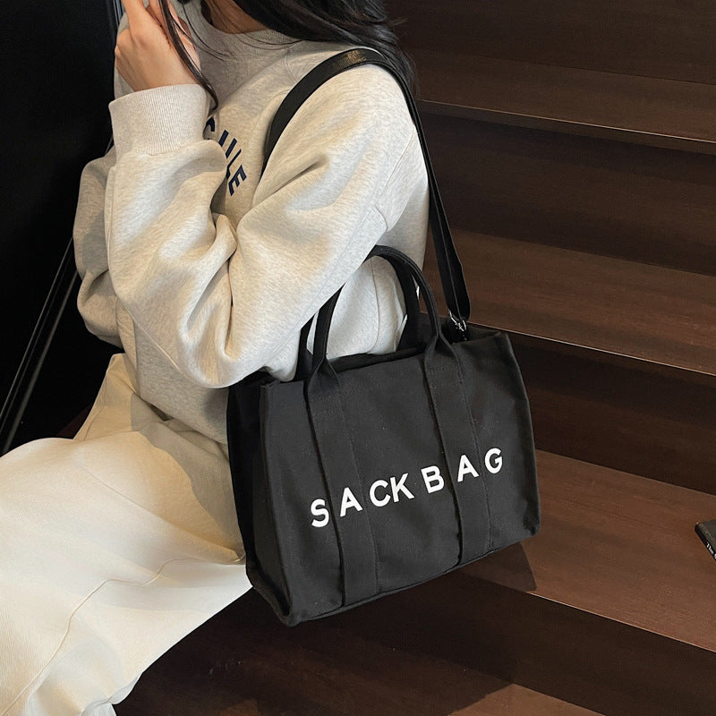 Cross-border women's bags new Korean version simple one-shoulder messenger bag women's letter printed tote bag retro portable canvas bag