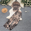 Vacation-ready pink floral print letter print casual two-piece set for women, featuring a summer short-sleeved top and high-waisted wide-leg pants. a stylish and versatile outfit perfect for both work and play