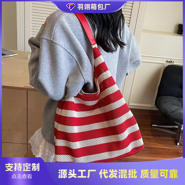 Cross-border premium contrasting striped woven bag large capacity hollow shoulder underarm bag tote bag leisure travel bag