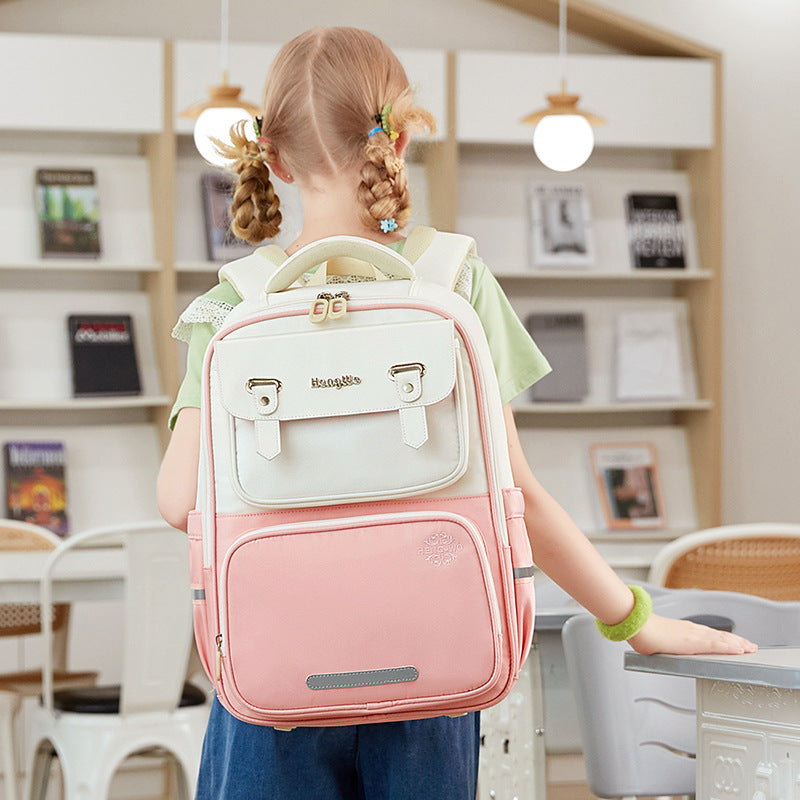 Student schoolbag large capacity kids burden reduction spine protection british style backpack factory direct sales lightweight anti-hunchback