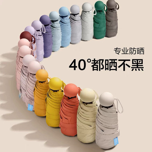 Capsule sun umbrella parasol women's sunscreen and UV protection dual-purpose mini 50% off small umbrella manufacturers wholesale