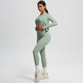 High-waisted, form-fitting yoga pants, a barely-there feel, quick-drying outer layer, and a long-sleeved tee – a women's three-piece activewear set perfect for running and workouts