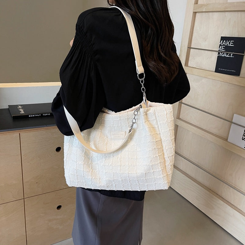 Canvas tote bag women's large capacity 2025 new casual shoulder bag summer versatile senior sense class commuter bag