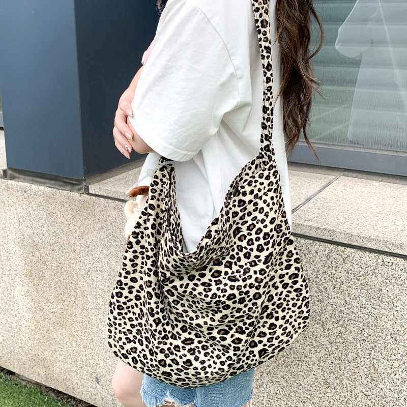 Cross-border new broken flower canvas bag messenger bag shopping bag fashion trend large capacity casual versatile women's shoulder bag