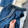 Chic hong kong style women's two-piece set: designer short-sleeve t-shirt with denim patchwork top + high-waisted casual straight-leg pants