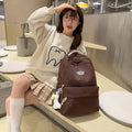 New schoolbag large capacity water-resistant embroidered backpack for junior and senior high school students - solid color, simple, and cute design