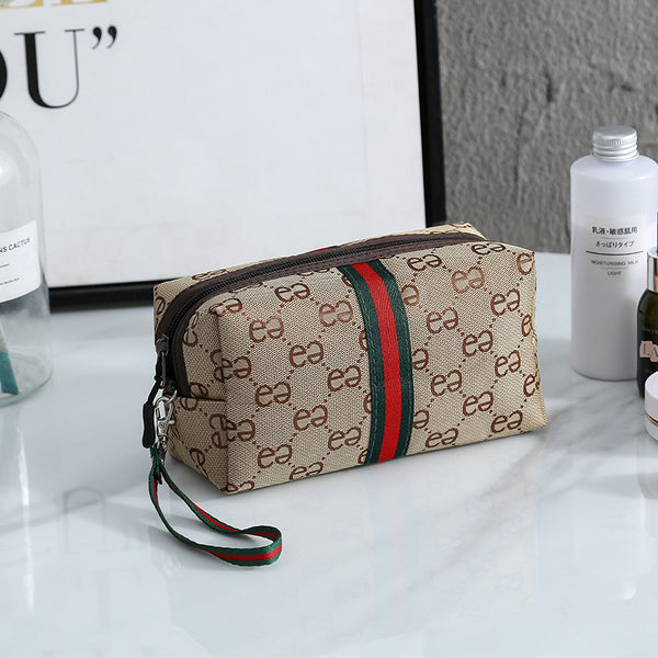 Korean version of hand cosmetic bag out simple bag portable change mobile phone storage bag large capacity Internet celebrity storage bag