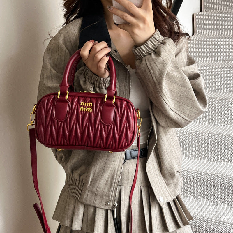 Niche pleated mini pillow bag 2025 new shoulder fashion crossbody bag autumn and winter retro handheld bowling bag