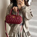 Niche pleated mini pillow bag 2025 new shoulder fashion crossbody bag autumn and winter retro handheld bowling bag