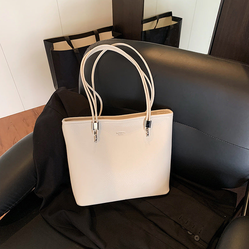 This year's trendy solid color women's bag: 2026 new fashion shoulder tote bag, versatile for commuting and casual use, women's handbag