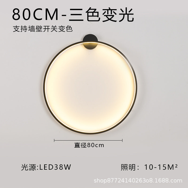 Minimalist chic large round wall sconce - stylish ambient lighting for living room backdrops, bedroom headboards, and more