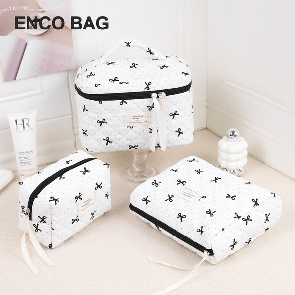Cross-border white polka dot bow cosmetic bag fashionable light luxury portable small fresh storage bag large capacity toilet bag
