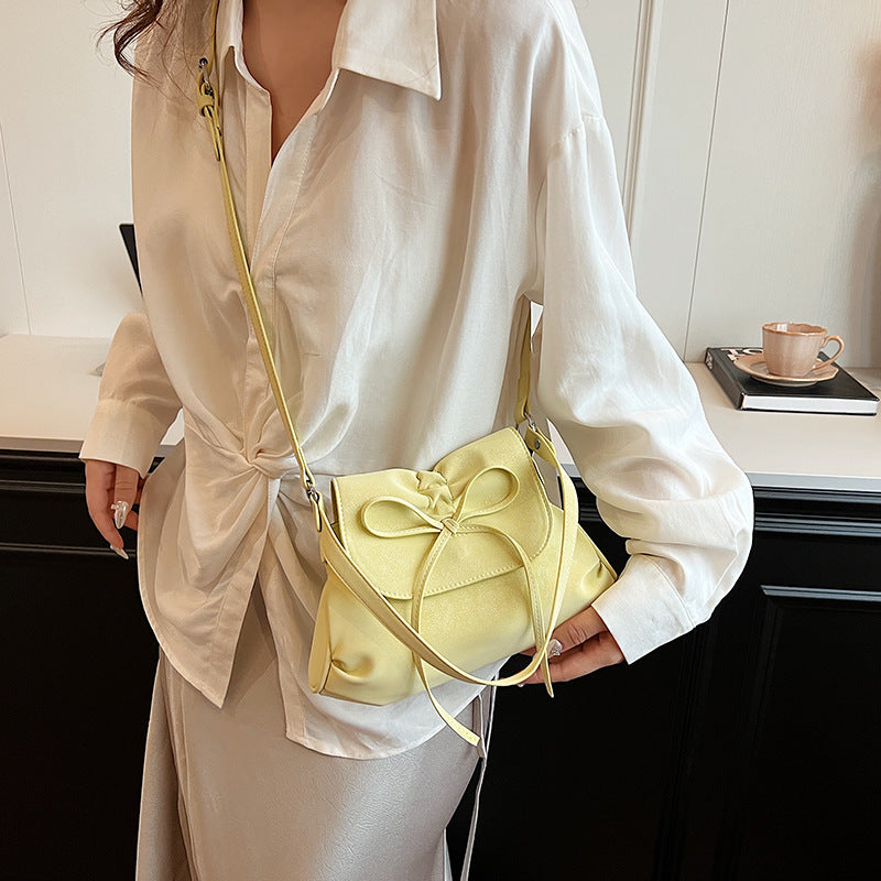 Solid color versatile bow small square bag women's bag 2025 new fashion simple shoulder bag foreign style portable commuter bag