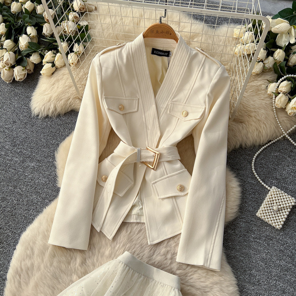 Elegant and chic chanel-inspired two-piece set: women's autumn outfit featuring a tie-waist cardigan and mesh skirt