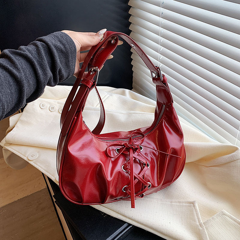Cross-border fashion niche straps dumpling bag women's 2025 new popular versatile single shoulder messenger bag commuter armpit bag