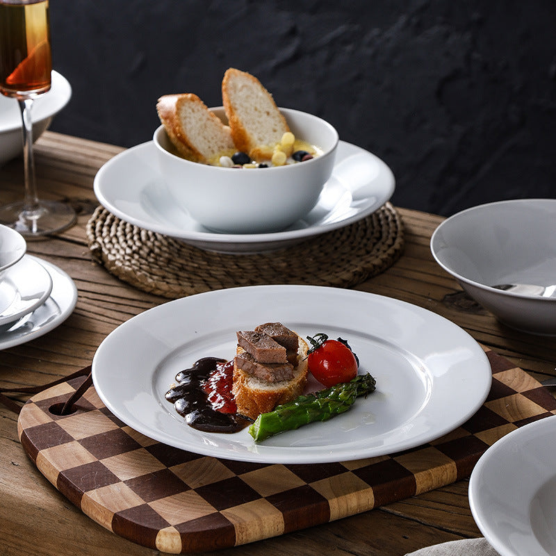 Minimalist pure white ceramic dinnerware set - ideal for restaurants, hotels, and home use. includes plates, rice bowls, soup bowls, and fruit/salad plating dishes