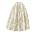 French chic floral midi skirt - high-waisted, slimming a-line design for women's spring collection