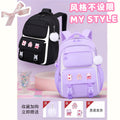New arrival primary and secondary school students backpack large capacity burden reduction spine protection student school bag small stuffed pendant and pin storage
